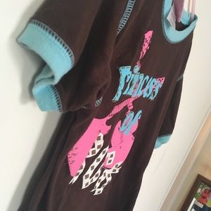 Kids brown T shirt that says “ princess of rock”